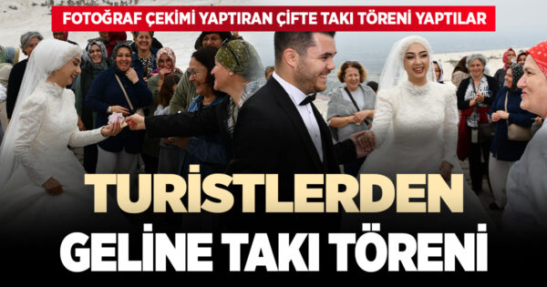 DÜĞÜN ÇEKİMİ İÇİN PAMUKKALE TRAVERTENLERİNE GİDEN ÇİFT İÇİN TURİSTLER TAKI KUYRUĞU OLUŞTURDU