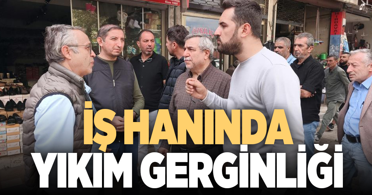 Denizli'de hukuki sürecin devam ettiği iş hanında yıkım hazırlıkları esnafı ayağa kaldırdı